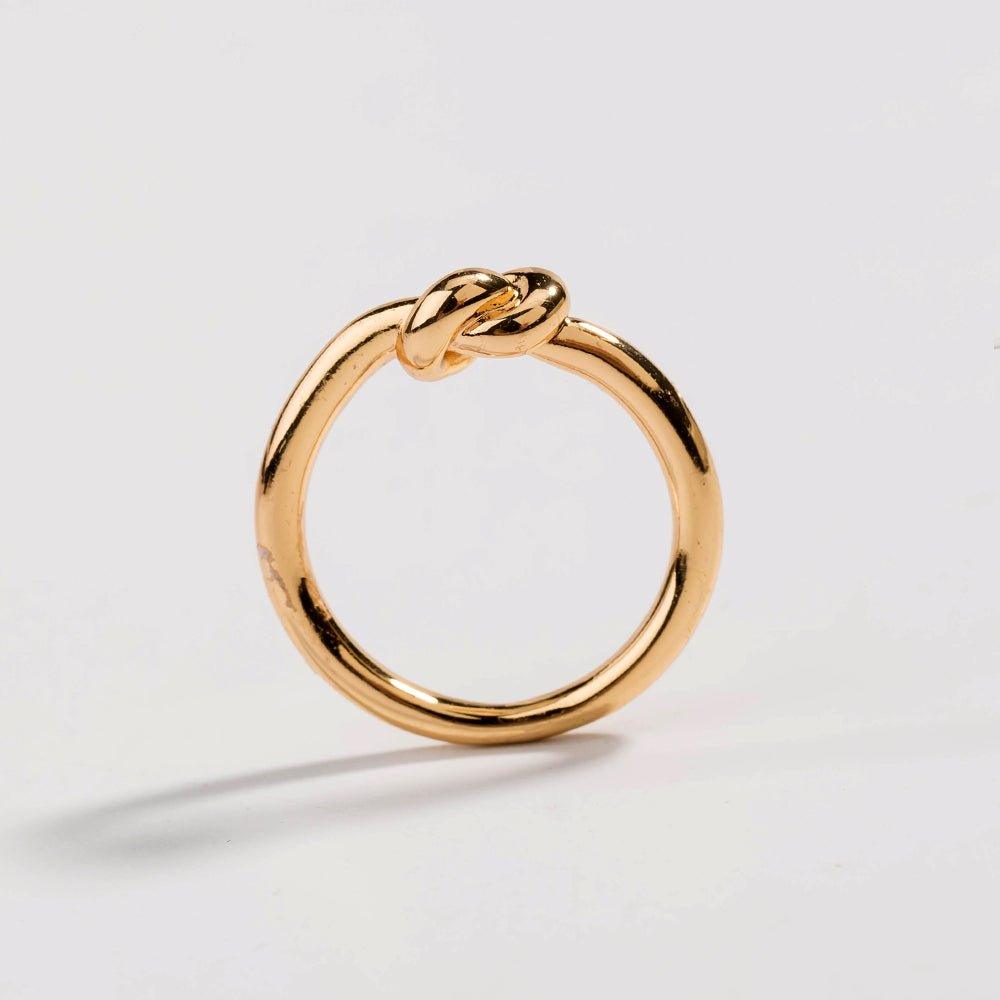 Gold love knot commitment ring, round band with sculpted knot detail
