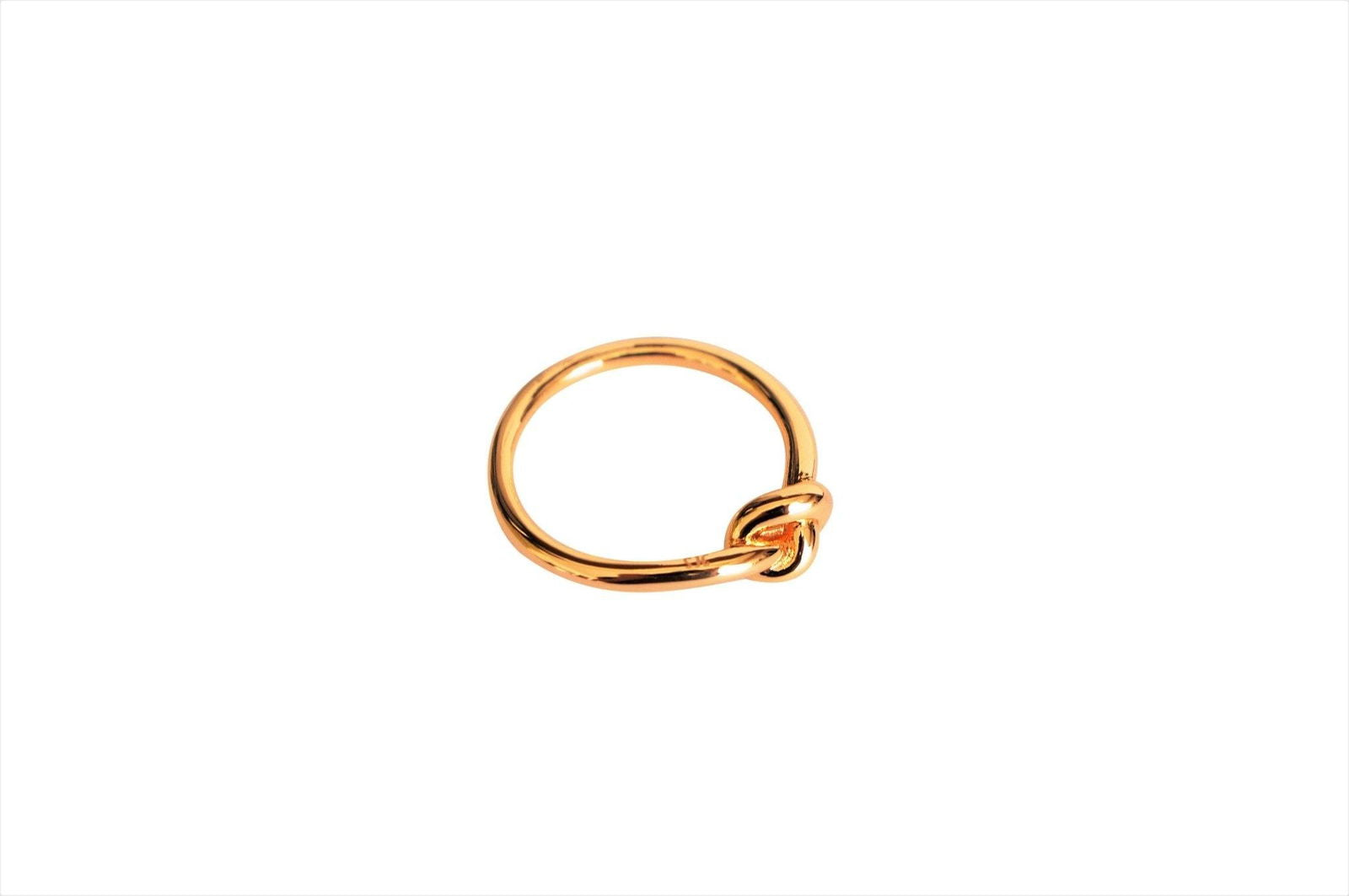 Gold love-knot commitment ring with twisted knot on a smooth band