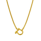 Gold carabiner pendant necklace with linked horseshoe charm on a gold chain