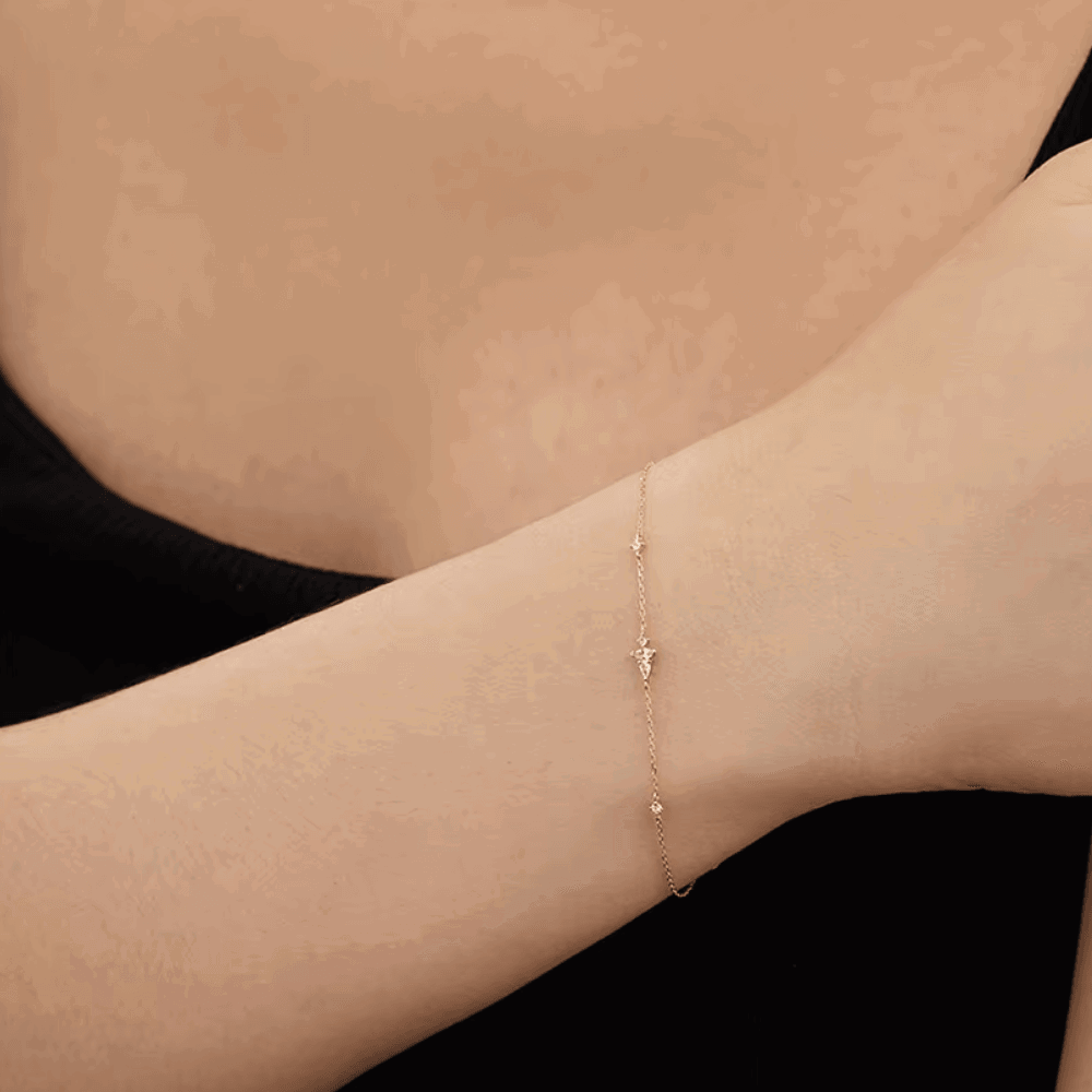 Gold dainty chain bracelet with small CZ drop charm and marquise accents