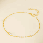 Gold cable chain bracelet with marquise CZ accents along the link line