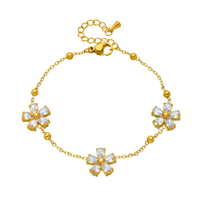Gold-tone bracelet with three clear crystal flower charms and round link chain