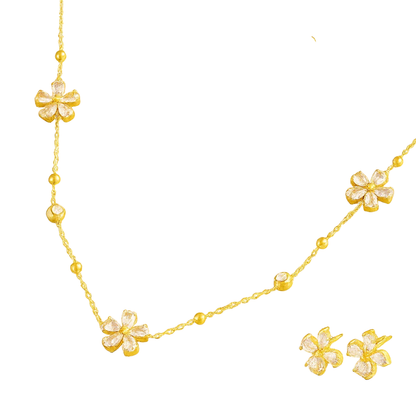 Gold-tone crystal blossom necklace with flower charms and bead chain