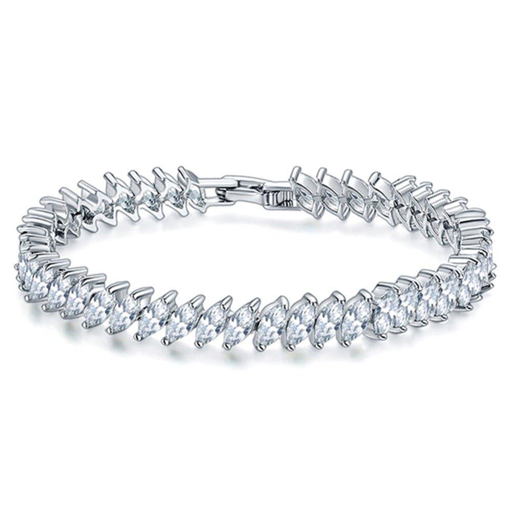 Silver-toned cubic zirconia tennis bracelet with marquise stone row and clasp