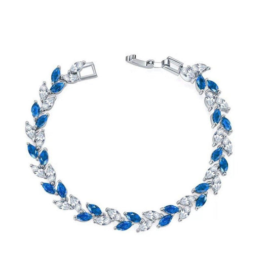 Silver tennis bracelet with blue marquise stones and clear cubic zirconia, box clasp