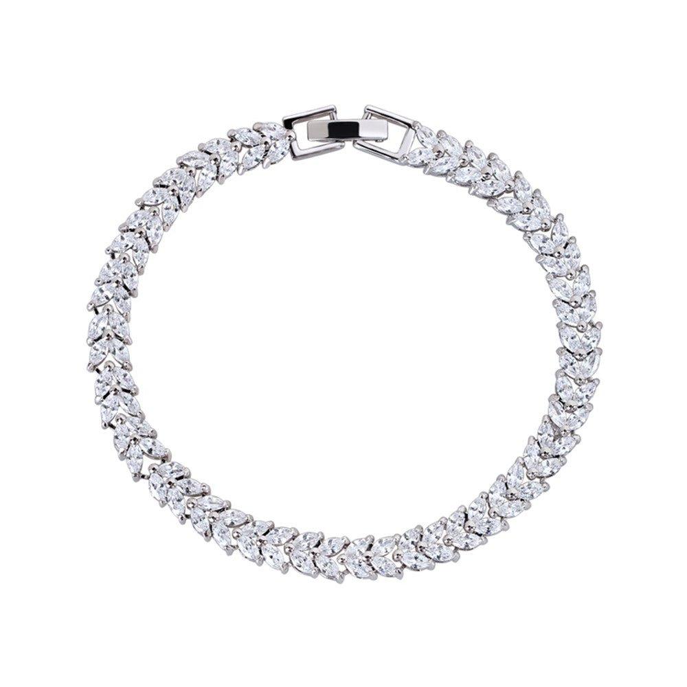 Cubic zirconia tennis bracelet with marquise and pear cut stones, silver-tone links