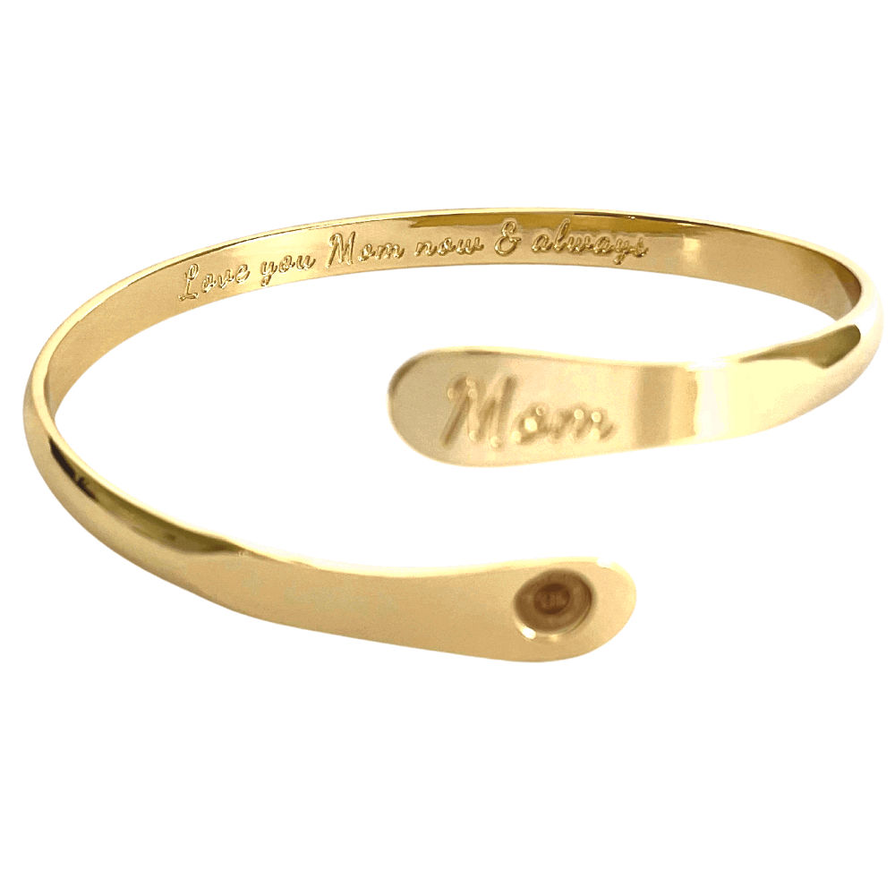 Gold mom bangle bracelet with engraved inner message and oval “Mom” medallion