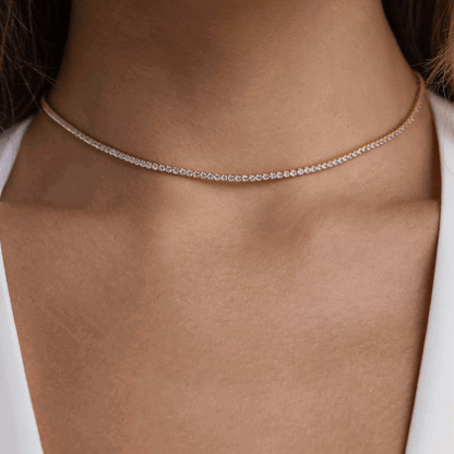 Silver-tone tennis necklace with a continuous row of round cubic zirconia