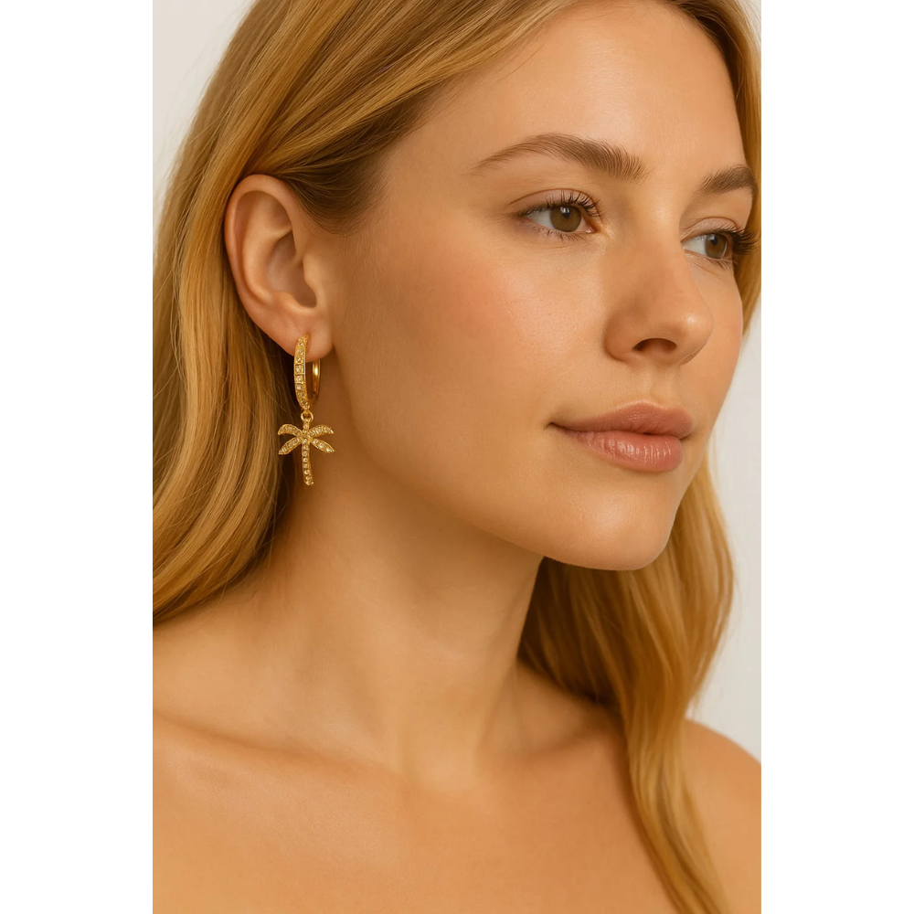 Gold hoop earrings with palm tree charm, sparkling cubic zirconia