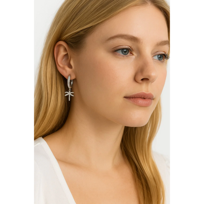 Silver hoop earrings with dangling palm tree charm, set with cubic zirconia