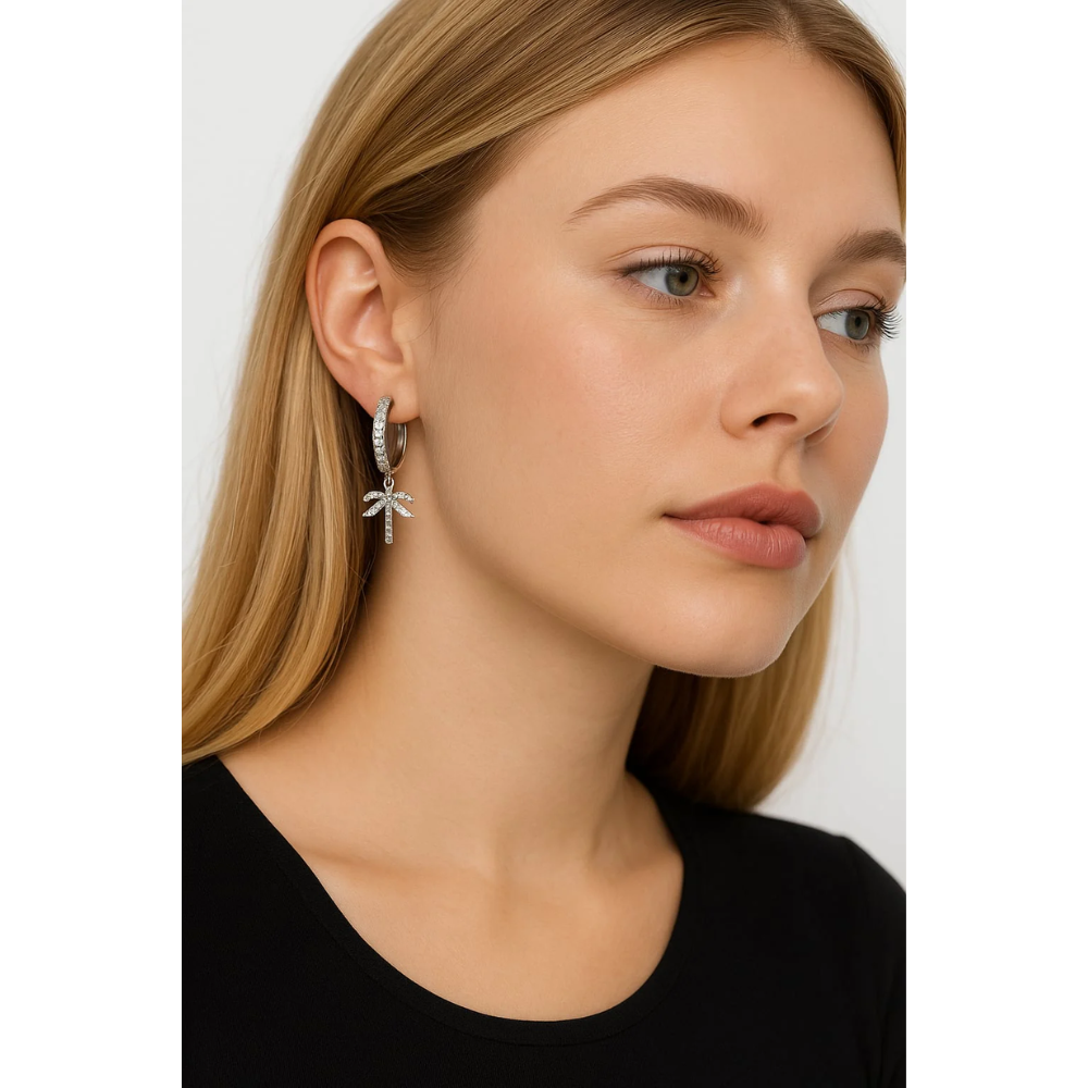Silver hoop earrings with palm tree charm and clear cubic zirconia
