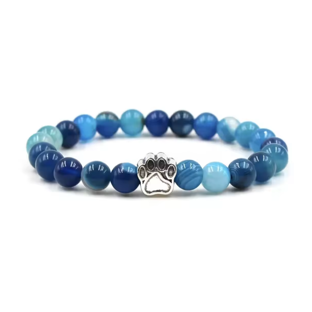 Blue gemstone-look bead bracelet with paw print metal charm center