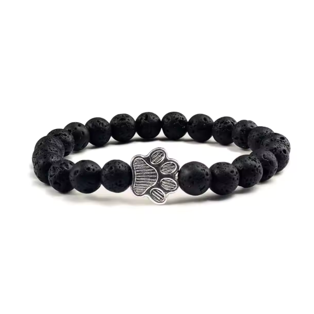 Black beaded charm bracelet with silver paw print centerpiece