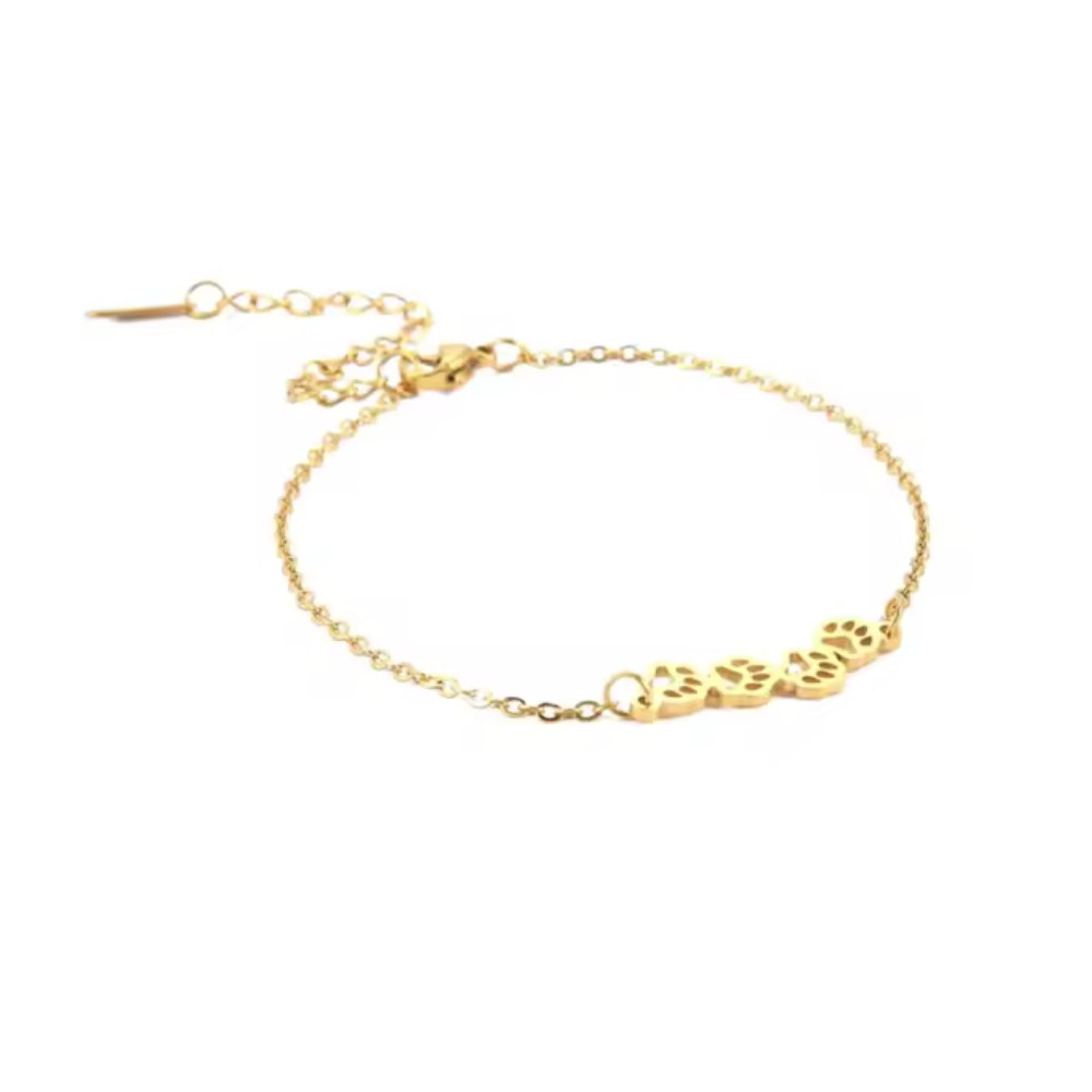 Gold paw-print link chain bracelet with small paw charms and lobster clasp