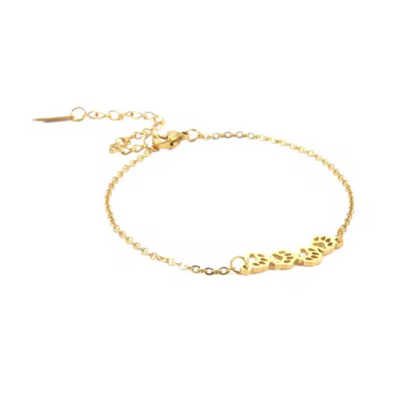 Gold paw-print link chain bracelet with small paw charms and lobster clasp