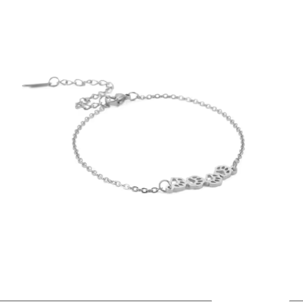 Silver paw-print link chain bracelet with small paw charms and lobster clasp