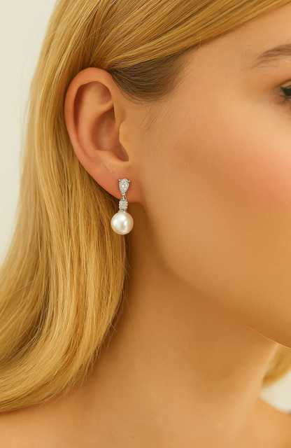 Silver-tone pearl drop earrings with cubic zirconia top and dangling round pearl