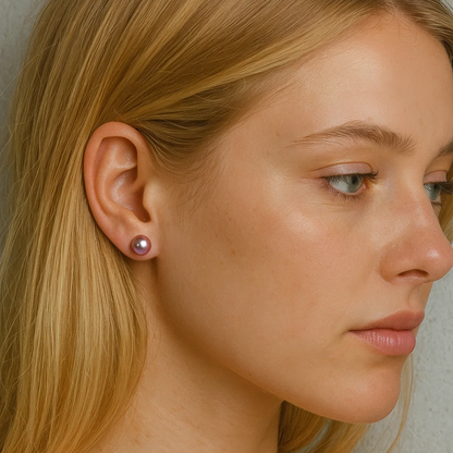 Champagne pearl stud earring on model ear, round pearl with metal backing