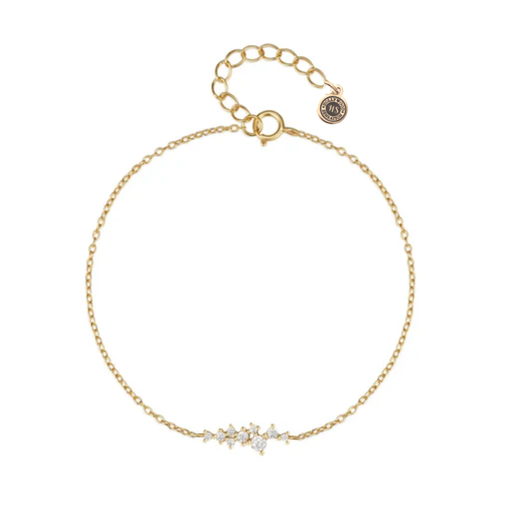 Gold-tone chain bracelet with adjustable clasp and three round cubic zirconia stones
