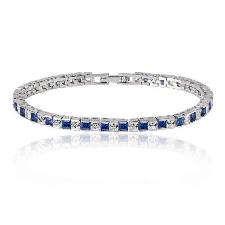 Silver tennis bracelet with princess-cut blue cubic zirconia stones, clasp closure