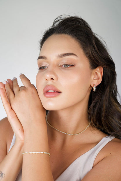 Radiant Glamour Huggie Hoop Earrings Embellished with Sparkling Cubic Zirconia