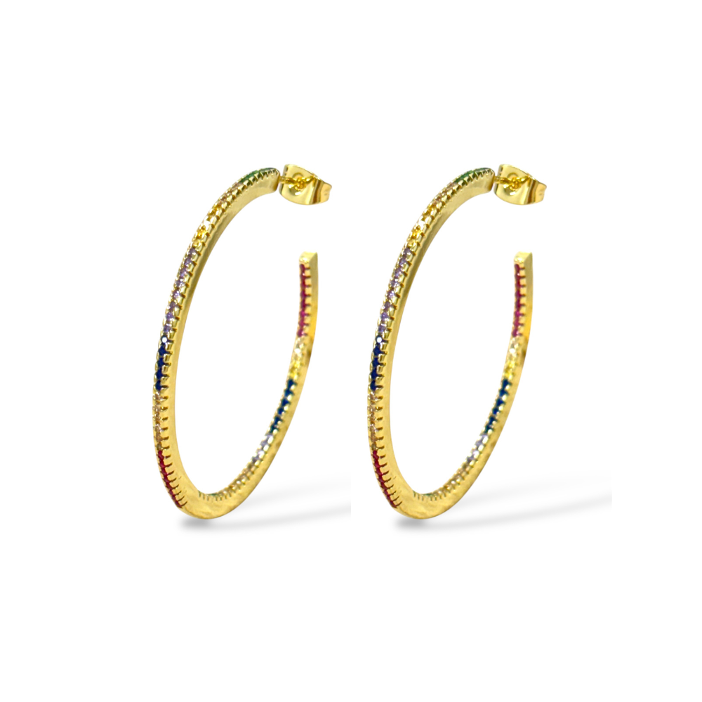 Gold-tone rainbow hoop earrings shown from side angle, multicolor stones