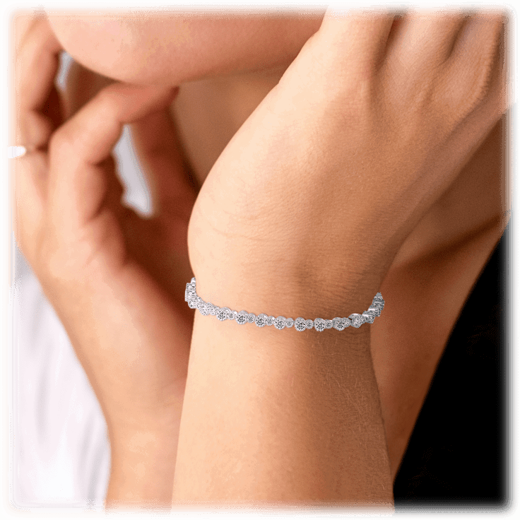 Cubic zirconia tennis bracelet worn on wrist, silver linked sparkle design