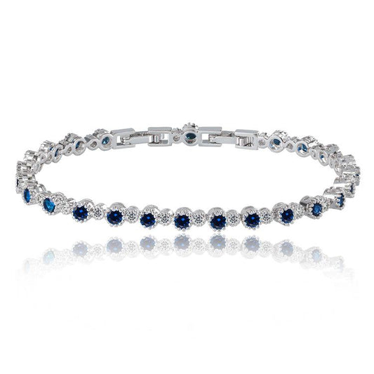 Blue and clear tennis bracelet with round cubic zirconia accents