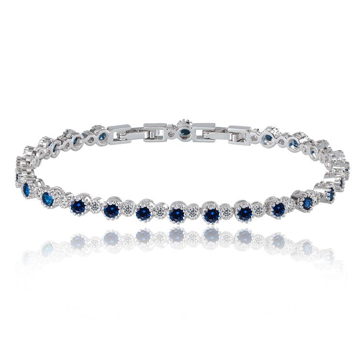 Blue and clear tennis bracelet with round cubic zirconia accents