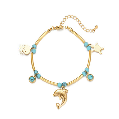 Gold-tone turquoise bead bracelet with dolphin, cat, heart charms and lobster clasp