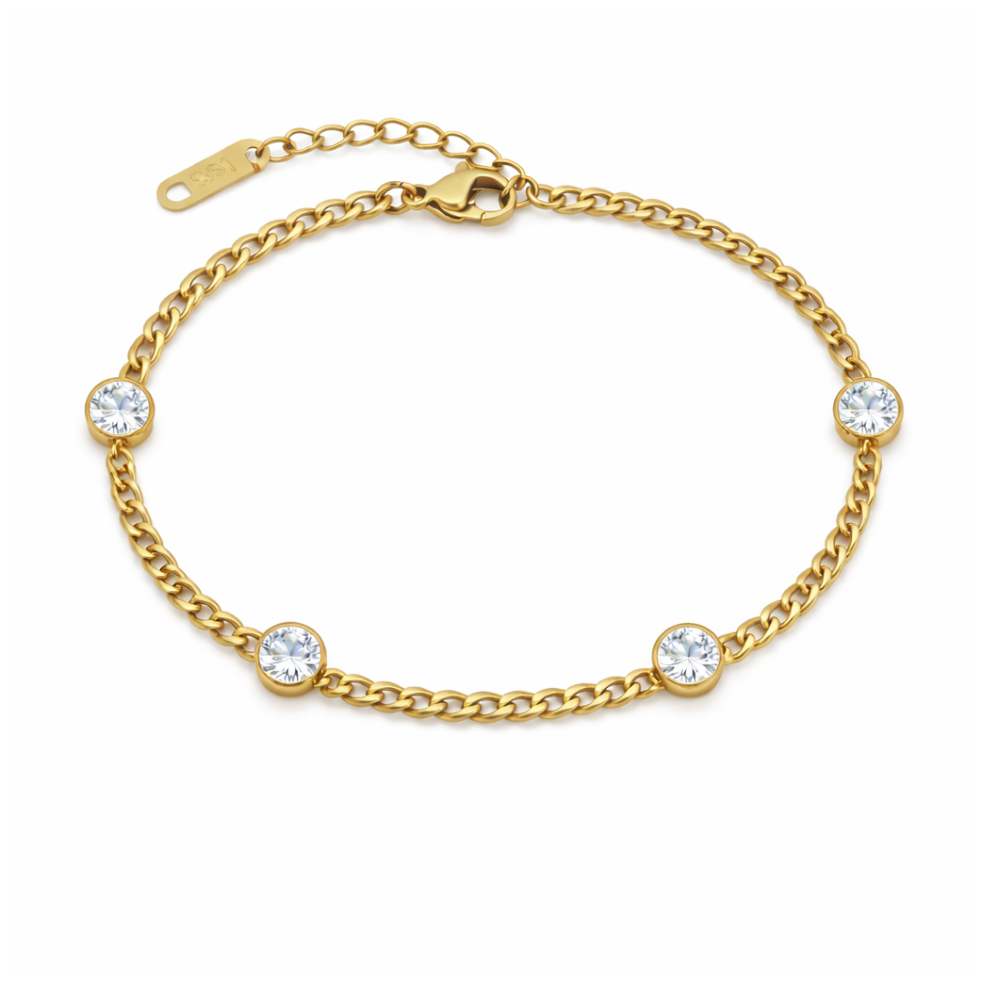 Gold bezel link bracelet with round clear-stone settings and toggle clasp