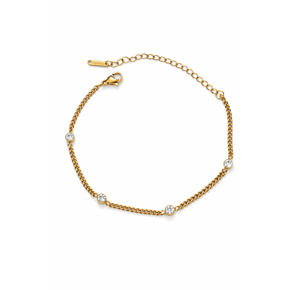 Gold bezel link bracelet with round clear stones and small toggle clasp