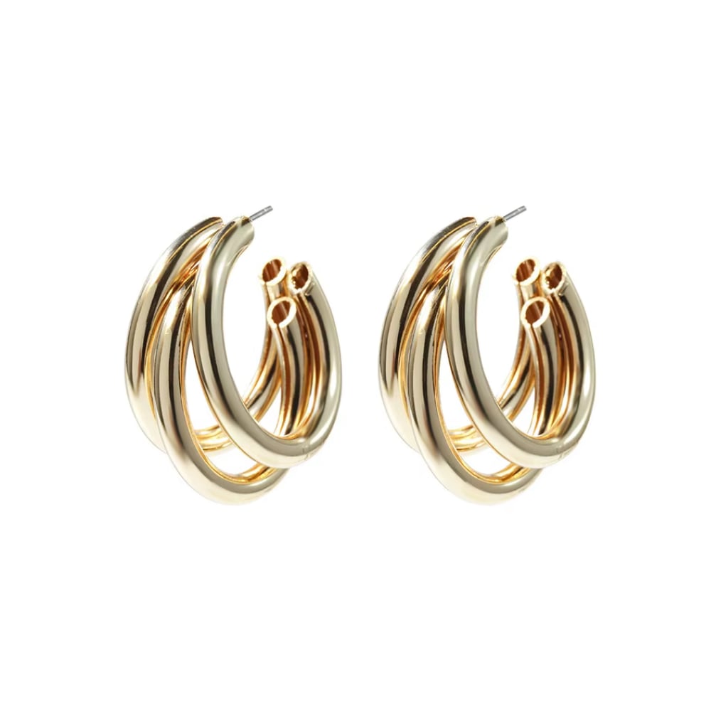 Gold triple huggie hoop earrings, stacked curved hoops with small charm detail