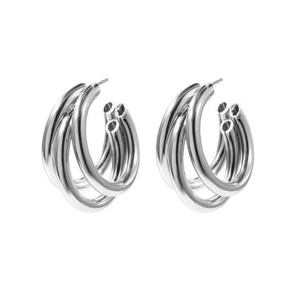 Silver triple huggie hoop earrings, stacked curved hoops with small charm detail