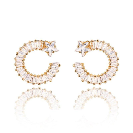 Gold shooting star hoop earrings with clear white cubic zirconia stones