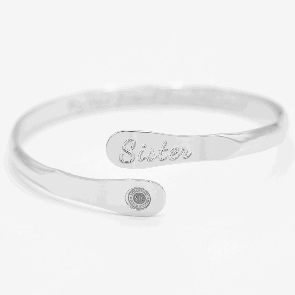 Silver sister engraved cuff bracelet with oval nameplate and round emblem