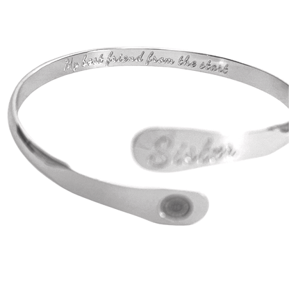Silver cuff bracelet with engraved inside text and oval centerpiece