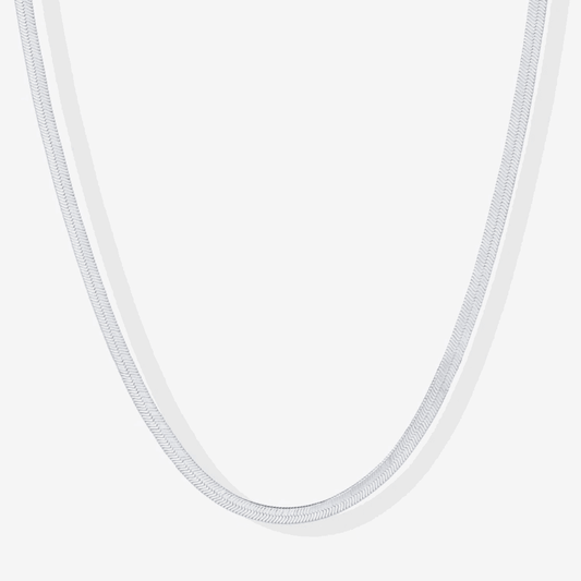 Silver snake chain necklace, close-up of smooth linked links.