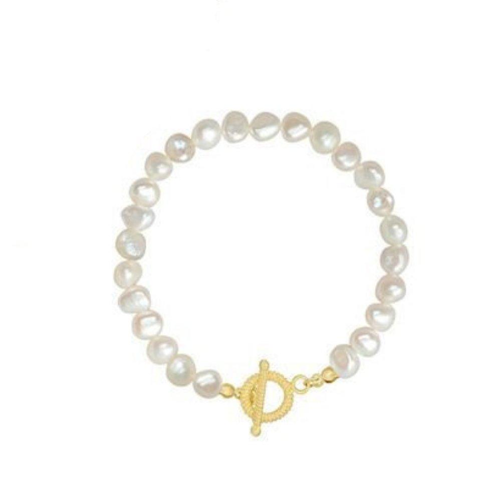 Freshwater pearl bracelet with gold baroque charm clasp