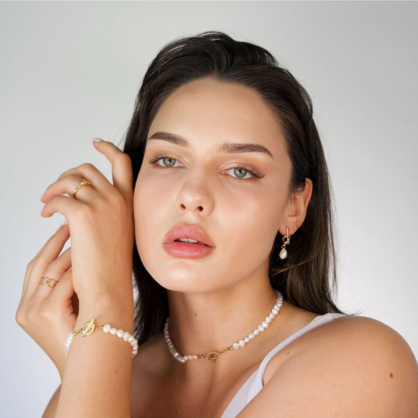 Freshwater pearl bracelet with gold baroque charm clasp, wrist accessory