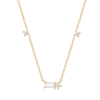 Gold tone delicate necklace with three round and one emerald-cut cubic zirconia pendant