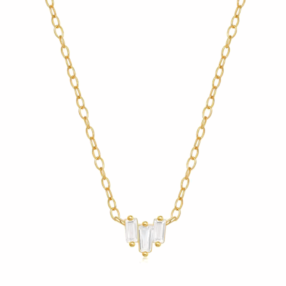 Gold-tone chain necklace with three emerald-cut cubic zirconia stones at center