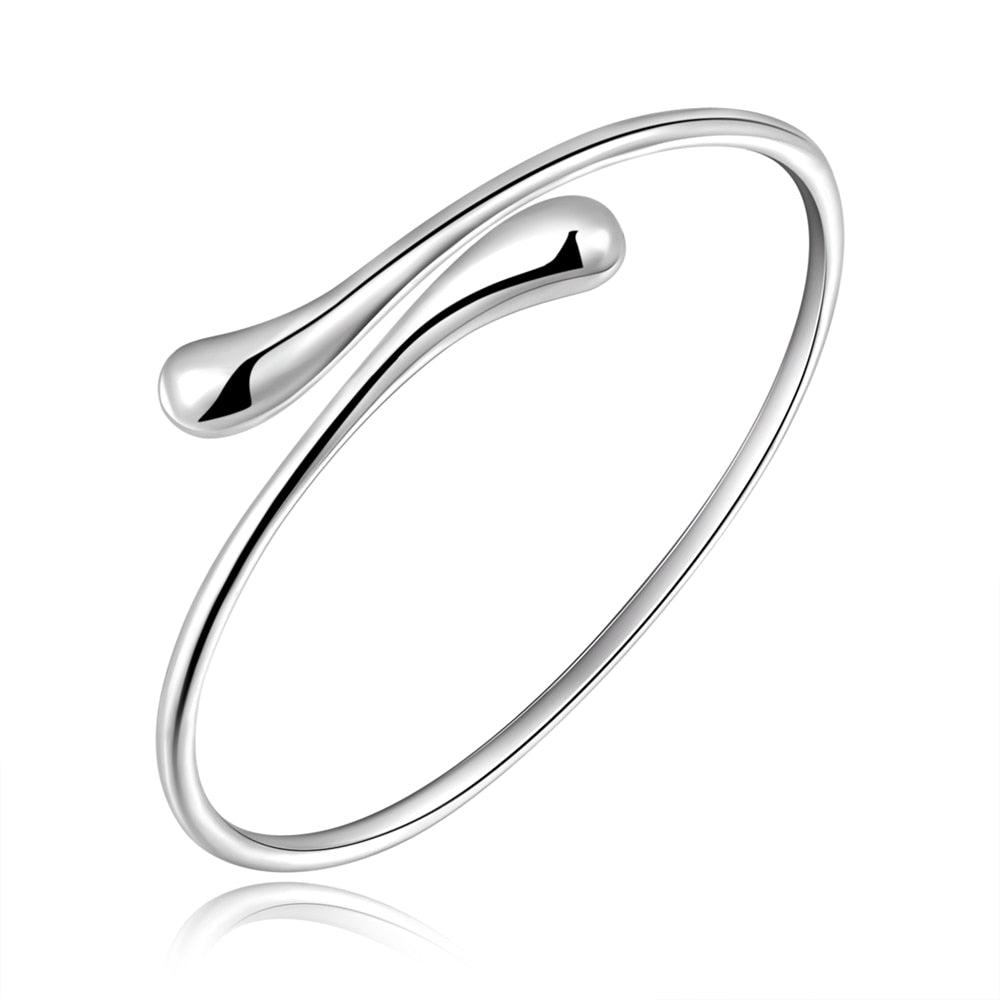 Silver teardrop cuff bracelet with smooth open teardrop accent