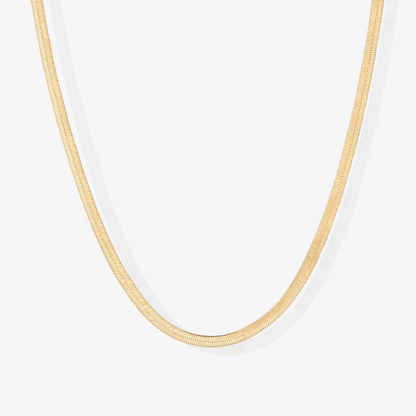 Gold snake chain necklace close-up, smooth slim links