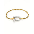 Two-tone bracelet: gold bead chain with silver horseshoe carabiner clasp and gold connector.