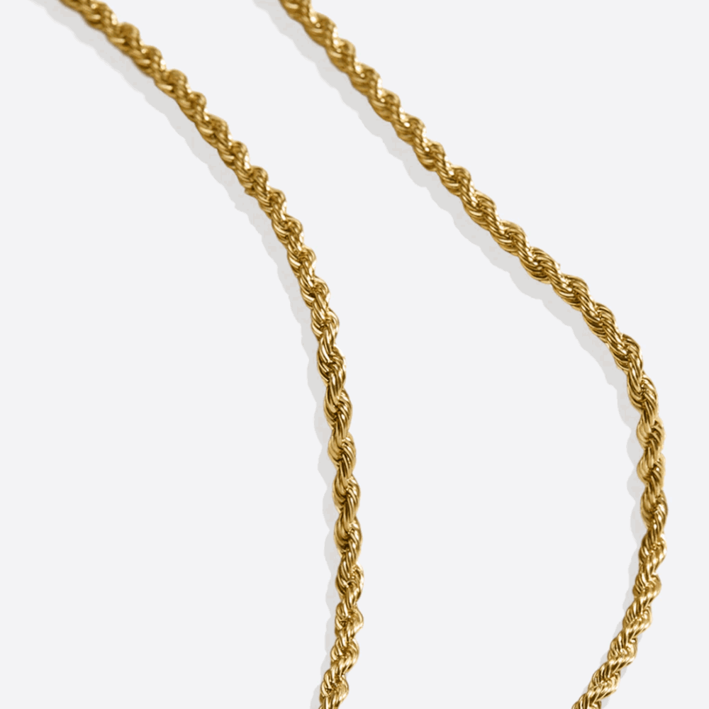 Gold rope chain necklace detail, vertical links