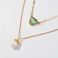Two-layer gold necklace with abalone heart pendant and wrapped white pearl drop