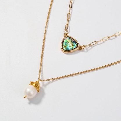 Two-layer gold necklace with abalone heart pendant and wrapped white pearl drop