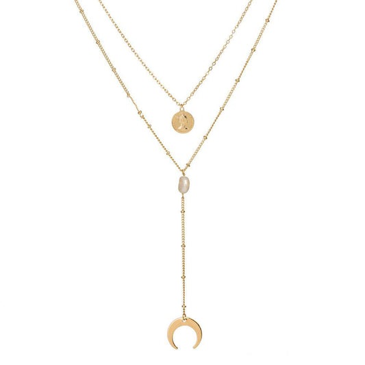 Two-layer gold necklace with moon charms, coin medallion, and pearl drop