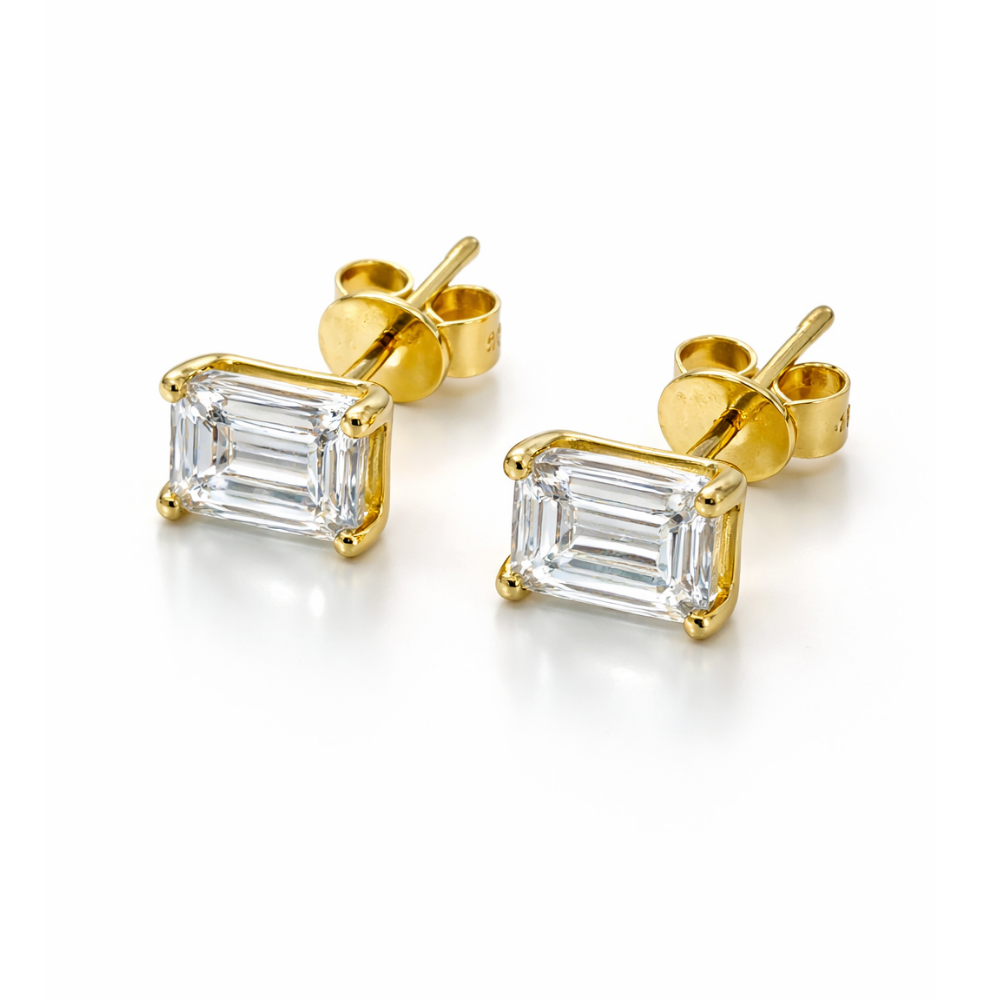 Gold vermeil emerald-cut stud earrings from side view with visible posts